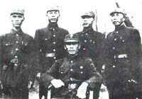 Xie Jinyuan and four of his subordinates while imprisoned