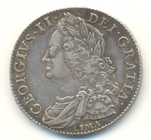 Half-Crown of George II, 1746. The inscription reads GEORGIUS II DEI GRATIA (George II by the Grace of God). Under the King's head is the word LIMA, signifying that the coin was struck from silver seized from the Spanish treasure fleet off Lima, Peru.
