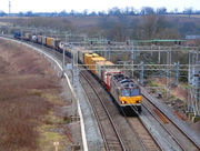Freight train with containers in the United Kingdom.