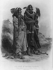 A pair of Mandan men in a print by Karl Bodmer. Note the buffalo-fur robes, moccasins, and the treatment of the hair.