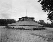 Dance lodge from the Elbowoods area on the Fort Berthold Reservation. This is a wooden version of the classic Mandan lodge built in 1923. This area was flooded in 1951. From the Historic American Engineering Record collection, Library of Congress.