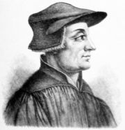 Ulrich Zwingli, wearing the scholar's cap.