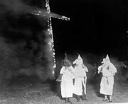 Cross burning is said to have been introduced by William J. Simmons, the founder of the second Klan in 1915.