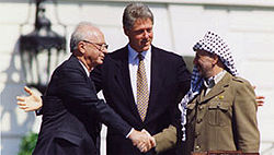 PLO leader Yasir Arafat and Israeli prime minister Yitzhak Rabin, with US President, Bill Clinton.