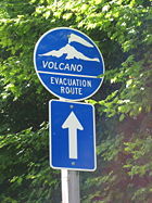 One of many emergency evacuation route signs in case of volcanic eruption or lahar around Mt. Rainier.