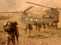 Soldiers board a Chinook helicopter.