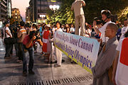The banner reads: "Human Rights Abuse Cannot Co-exist with Beijing Olympics", picture taken during the opening of the Human Rights Torch Relay event