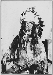 Potawatomi chief Kack-Kack with eagle feather war bonnet, c.1925.