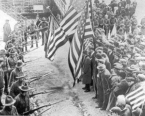The Lawrence textile strike (1912), with soldiers surrounding peaceful demonstrators