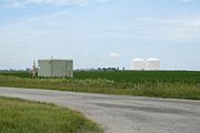 Peoples Gas Manlove Field Natural gas storage area in Newcomb Township, Champaign County, Illinois. In the foreground is one of numerous wells for the underground storage area, with an LNG plant and above ground storage tanks in the background.