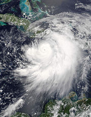 Hurricane Dennis on July 7, 2005 at 1550 UTC, beginning to pass to the north of Jamaica. Jamaica, eastern Cuba, and Hispaniola are all obscured by the storm.