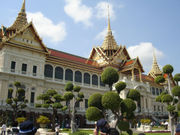 Chakri Maha Prasat Throne Hall, a 19th century styled building with a traditional Thai stucco roof, located within the Grand Palace compound.