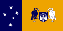 The Flag of Australian Capital Territory was adopted in 1993 and features the Southern Cross and the Coat of Arms.