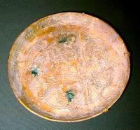 This earthenware dish was made in 9th century Iraq. It is housed in the Freer Gallery of Art of the Smithsonian Institution in Washington, D.C.