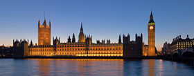 The Palace of Westminster at dusk, showing the Victoria Tower (left) and the Clock Tower colloquially known as 'Big Ben', lies on the bank of the River Thames in the heart of London