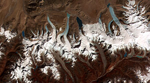 This NASA image shows the formation of numerous glacial lakes at the termini of receding glaciers in Bhutan-Himalaya.