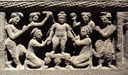 The Buddha as a child, taking a bath. Gandhara, 2nd century CE.
