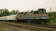 A Michigan-bound Amtrak train passes through Porter, Indiana, after departing from Chicago in 1993.