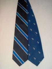 The two variants of the school tie for Phillips Academy. The striped version uses American-style stripes (high side of stripe on wearer's right).