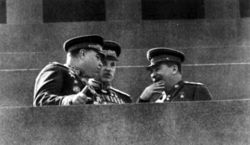 Vasilevsky, Rokossovsky and Stalin on Lenin Mausoleum's tribune during a military parade.