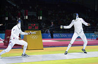 Russian Igor Tourchine and American Weston Kelsey fence in the second round of the Men's Individual Épée event in the 2004 Summer Olympics at the Helliniko Fencing Hall on August 17, 2004.