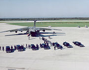 The remains of the Challenger crew are transferred to a C-141 bound for Dover Air Force Base, Delaware