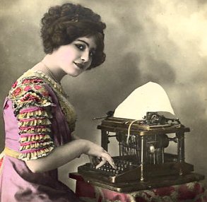 Because the typebars of this typewriter strike upwards, the typist in this French postcard, c. 1910, could not have seen characters as they were typed.