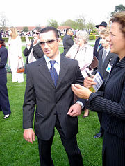 Local celebrity jockey Frankie Dettori in the parade ring at Newmarket after riding in the 2005 2,000 Guineas.