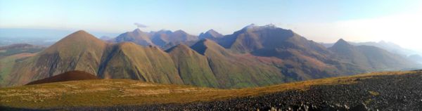Panorama of some of the Snowdon Massif including Snowdon (centre right) taken from Mynydd Mawr.  The Glyderau are visible in the distance.