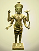 An 11th or 12th century Cambodian bronze statue of Vishnu.