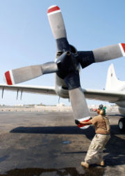 Rotating the Hamilton Standard 54H60 propeller on a US Navy EP-3E Orion's number four engine as part of pre-flight checks