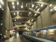 Metro train departing Montreal's Place-Saint-Henri Metro Station.
