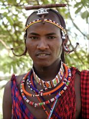 Kenyan man wearing tribal beads.