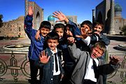 Boys pose for a picture at Registan.  Over a third of Uzbekistan's population is under 14 years old.