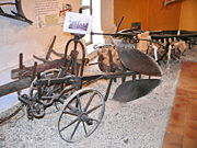 Horse-drawn, reversible plough.