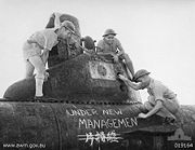 Australian sailors take possession of a midget submarine at a Japanese naval base near Toyko in September 1945.
