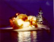 USS New Jersey fires a broadside of 16-inch (406 mm) guns