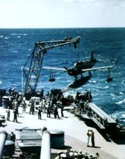 USS Missouri recovers an Vought OS2U Kingfisher during her 1944 shakedown cruise. Note the catapult below the plane, which was used to launch the planes off the battleship.