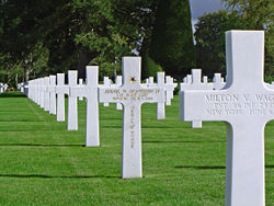 The grave of a recipient at the Normandy American Cemetery and Memorial