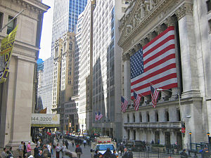 Elaborate marble facade of NYSE as seen from the intersection of Broad and Wall Streets