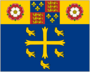 Flag of Westminster Abbey, featuring the Tudor Arms between Tudor Roses above the supposed arms of Edward the Confessor