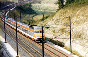 A TGV Sud-Est set in the original orange livery, since superseded by silver and blue.