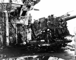 The burned-out 5 inch (127 mm) gun gallery on Enterprise, photographed after the battle