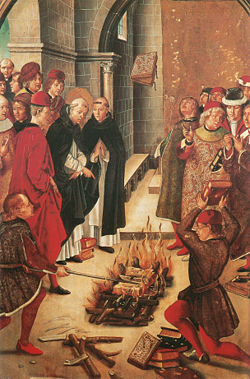 An image frequently misinterpreted as the Spanish Inquisition burning prohibited books. This is actually Pedro Berruguete's La Prueba del Fuego (1400s). It depicts a legend of St Dominic's dispute with the Cathars: they both consign their writings into the flames, and while the Cathars' text burn, St Dominic's miraculously leaps from the flames.