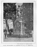 The Bach monument that was constructed in 1884 by Adolf von Donndorf and erected in front of the Georgenkirche at the Marktplatz in Eisenach.