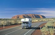 Driving on Lasseter Highway from Uluru - Kata Tjuta National Park.
