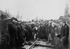 Donald Smith, later known as Lord Strathcona, drives the last spike of the Canadian Pacific Railway, at Craigellachie, 7 November 1885. Completion of the transcontinental railroad was a condition of BC's entry into Confederation.