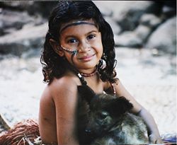 A girl with a dog at Island of Wagifa