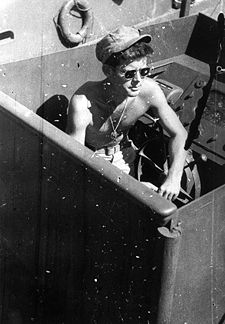 Lt. Kennedy on his navy patrol boat, the PT-109