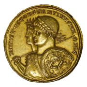 A gold multiple of Constantine with Sol Invictus, printed in 313. The use of Sol's image appealed to both the educated citizens of Gaul, who would recognize in it Apollo's patronage of Augustus and the arts; and to Christians, who found solar monotheism less objectionable than the traditional pagan pantheon.